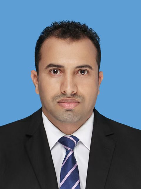 Formal portrait of Ali Alfatemi